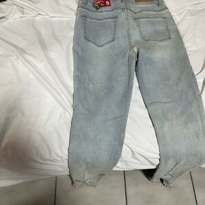 Light Blue Denim Jeans with Embroidered Patch